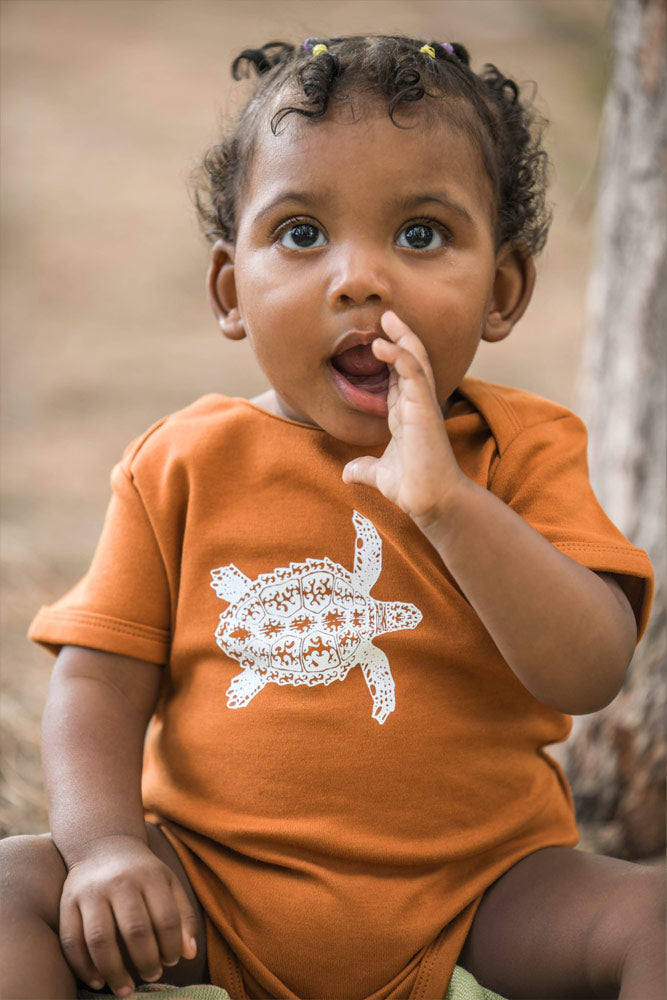 BODY BEBE TORTUE CARET